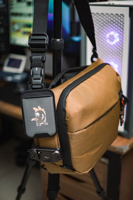 Small Bluetooth tracker attached inside a travel bag while on the go