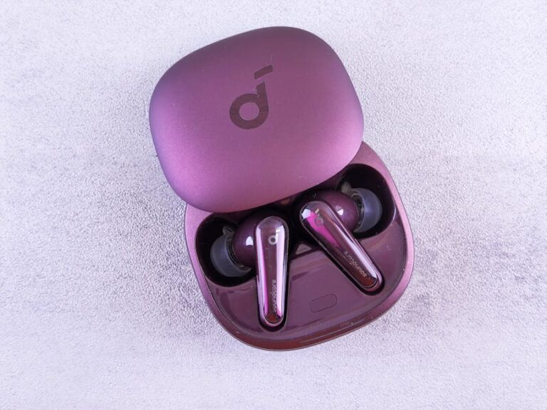 Gadget Review Roundup: budget noise-canceling earbuds, tested for calls, comfort, and battery—clean product shot on desk