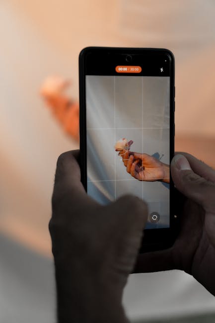 Close-up of hands adjusting smartphone security and lock settings