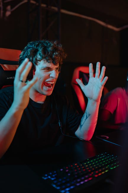 Player gaming at a desk with a CPU-focused performance monitor highlighting stutters and spikes