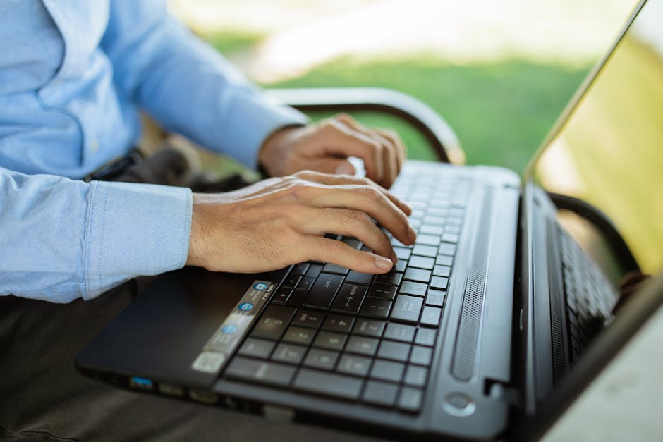 Person using a laptop with fast, focused AI work&mdash;illustrating local speed advantages.