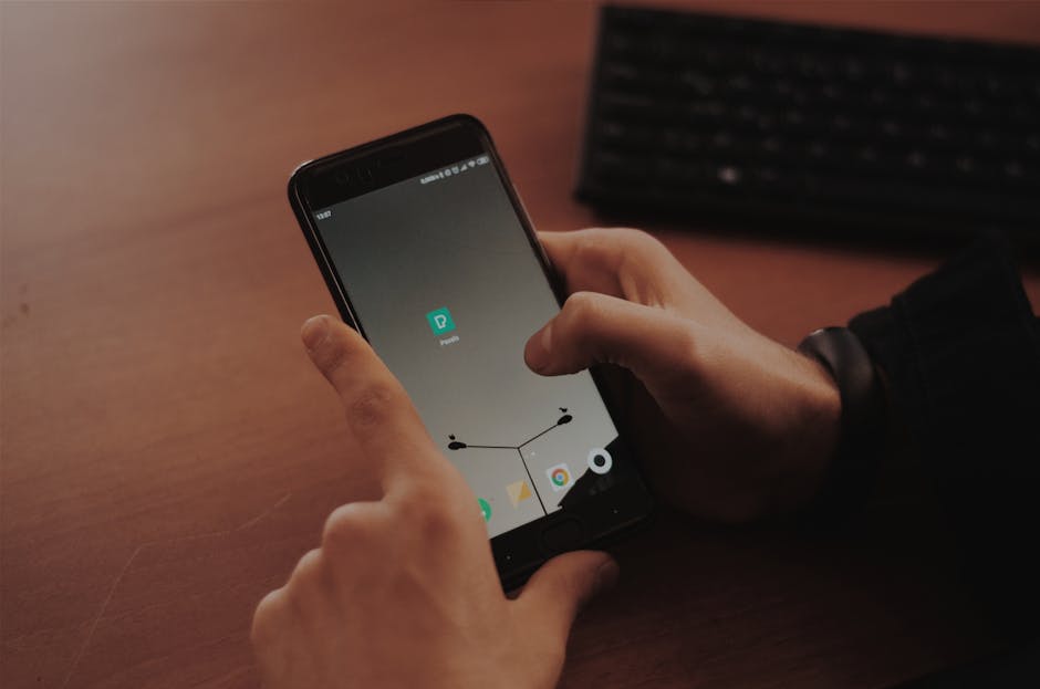 Person tapping smartphones for quick NFC contact sharing