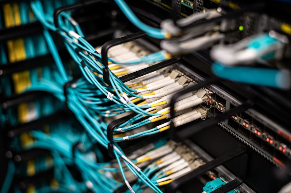 IT security analyst monitoring network connections in a server room during data access