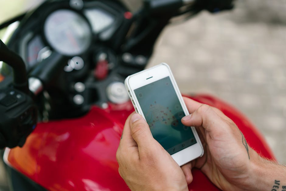 Cyclist checking a smartwatch GPS display during a ride outdoors
