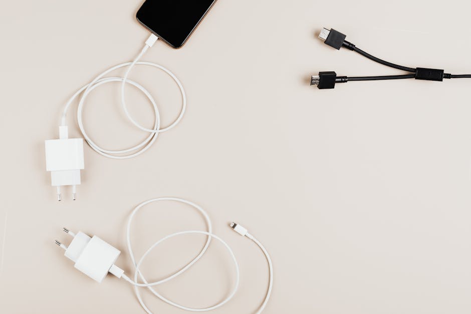 Worn USB-C cable with frayed connector showing strain relief damage