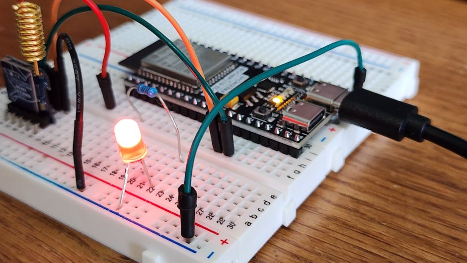 Breadboard and microcontroller with jumper wires and power supply for stable IoT prototyping