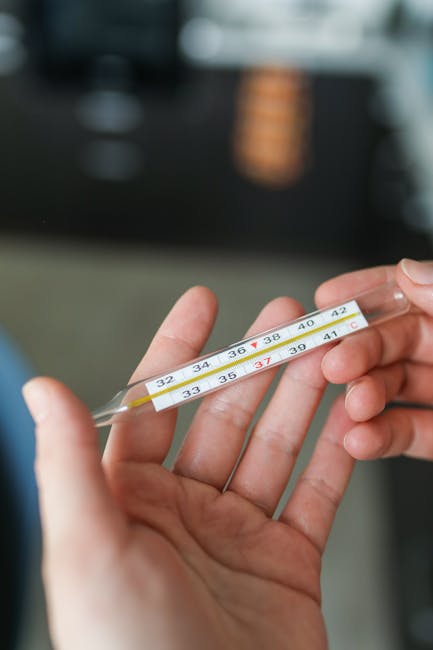 Surface thermometer measuring temperature on a portable SSD during file transfer