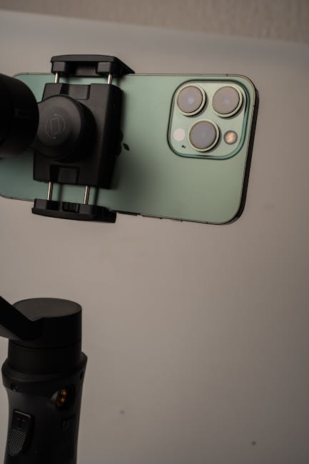 Close-up of an iPhone Camera Tech Explained display showing sensor size, stabilization, and night mode features.