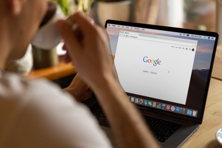 Person inspecting a stream link on a laptop browser address bar