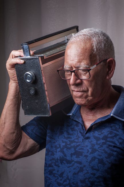 Headphones on as a person listens to an online radio stream