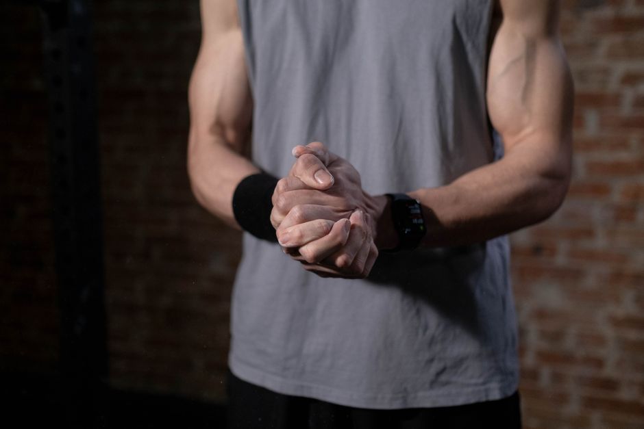 Close-up of a smartwatch on a moving wrist during a workout, illustrating sensor interference.