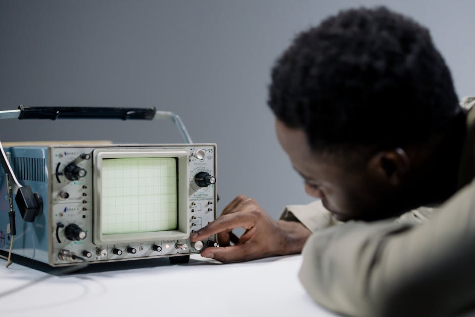 Traveler using a power meter while testing AC and DC output on a portable power station