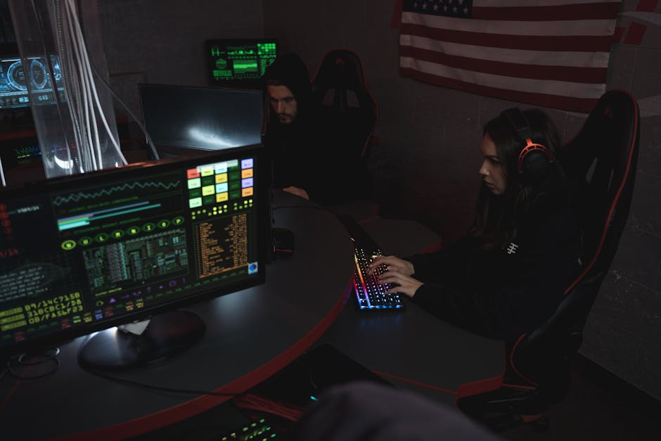 Analyst viewing security alerts and risk scores on a dashboard in an operations room