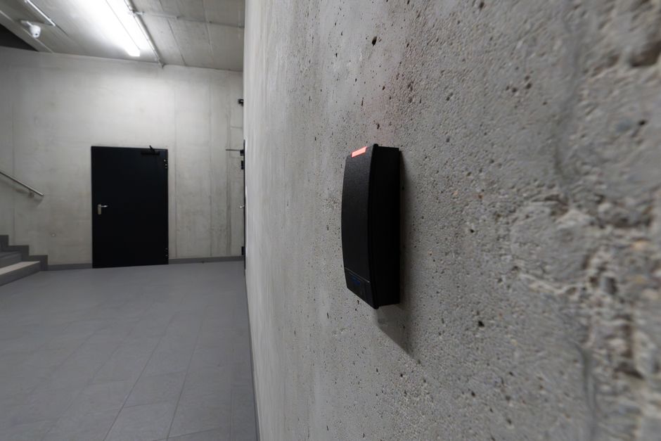 Small door window sensor mounted on a home door frame