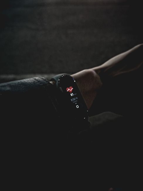 Wearable Tech Review Roundup: smart watch fitness band display showing sleep, heart rate, and battery life metrics.